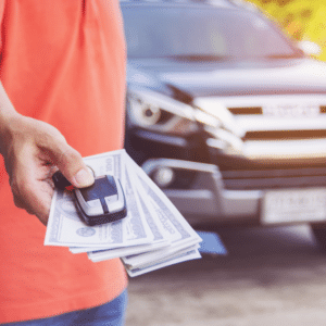 Handing over cash for a junk car exchange